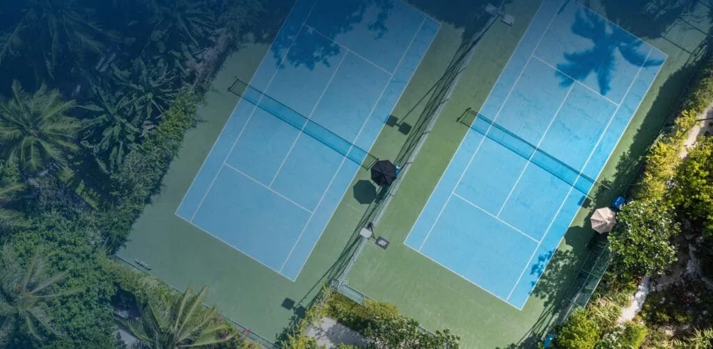 Aerial view of newly paved/painted tennis court