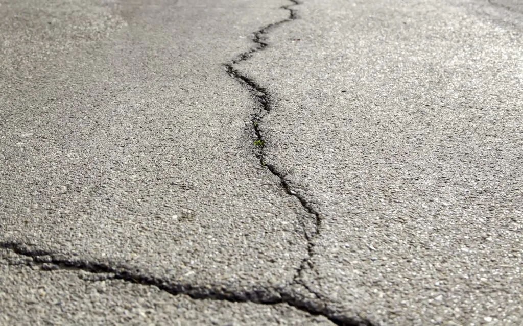 Pro-Pave crack filling and crack repair on asphalt pavement for long-term maintenance