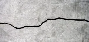 Asphalt crack requiring repair and crack filling