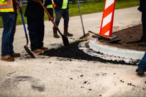 Patching & Pothole Repairs being done by Pro-Pave, an expert paving company