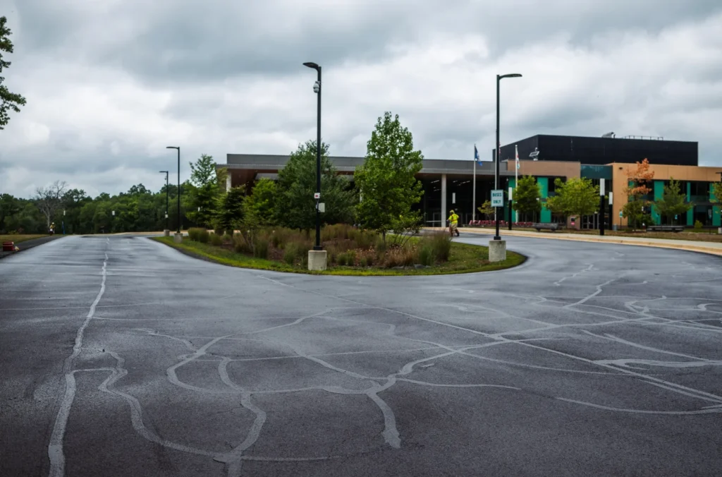 Freshly sealcoated commercial parking lot with new pavement markings in Virginia and D.C.