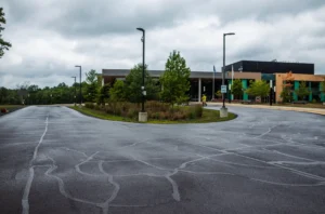 Freshly sealcoated commercial parking lot with new pavement markings in Virginia and D.C.