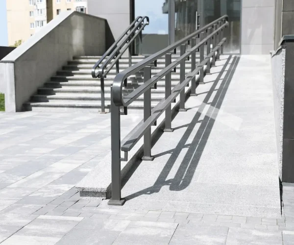 Outdoor stairs with ramp and metal railing