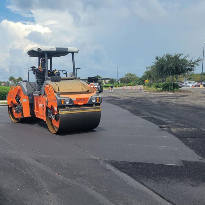 Pro-Pave, Inc. Paving Contractors laying asphalt