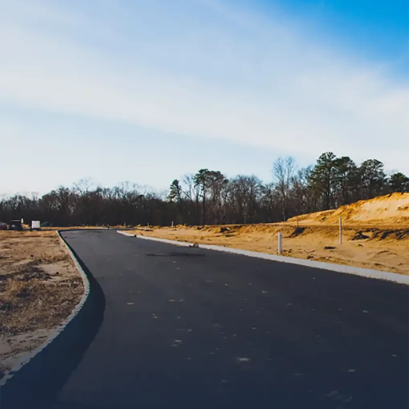Empty newly paved road
